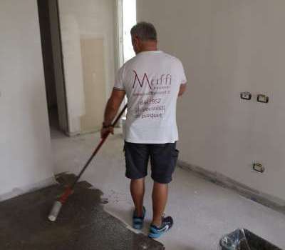 Preparazione massetto per posa parquet con firma